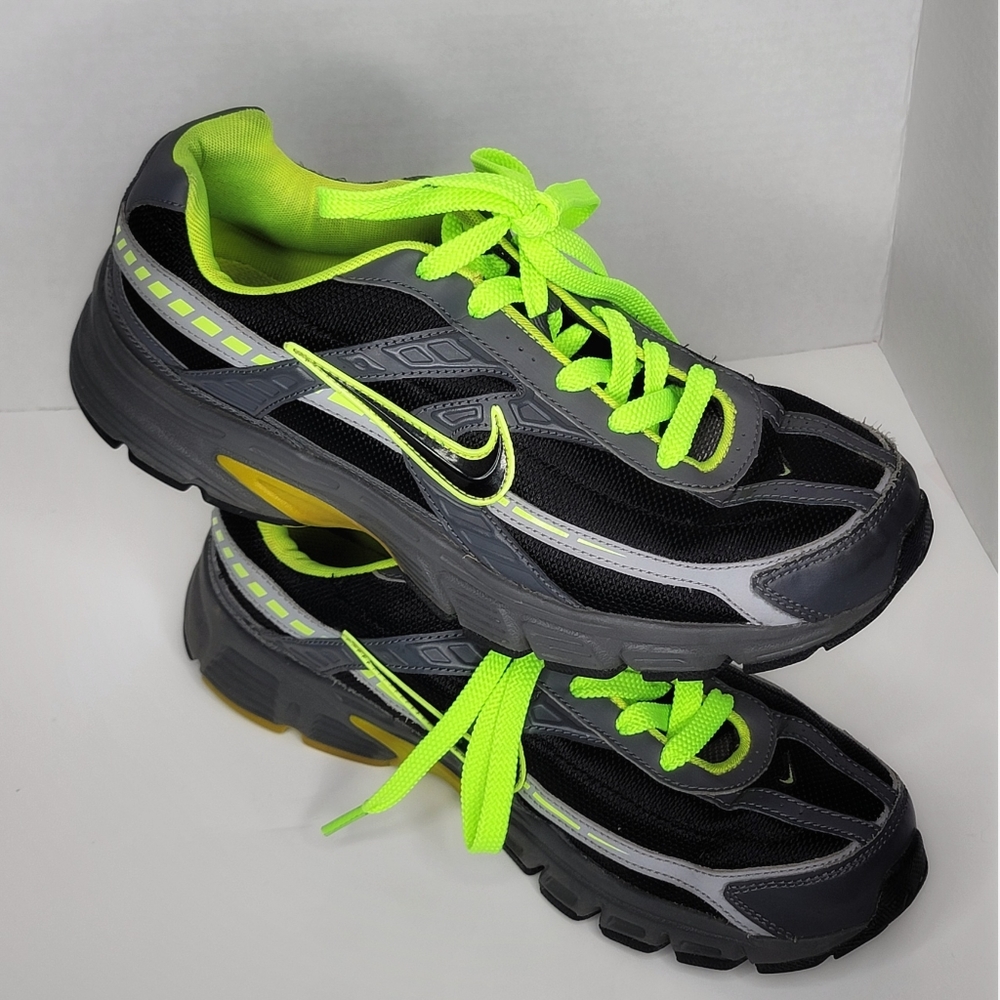 261S507Nike Silver and Neon Orange Athletic Shoes